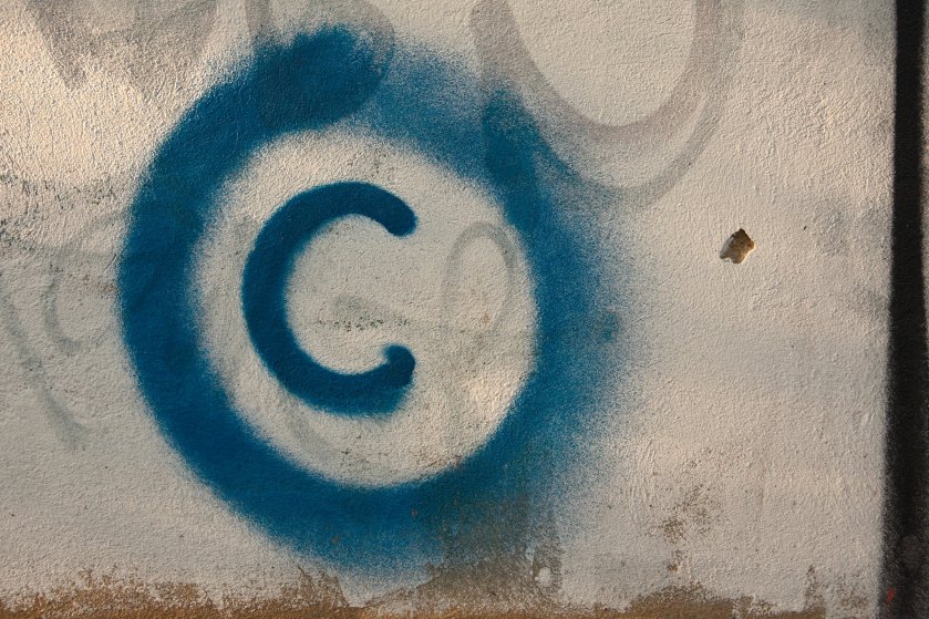 spray painted copyright symbol